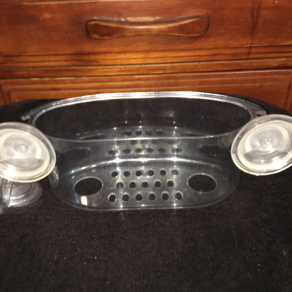 Clear suctioning bathroom caddy and hook